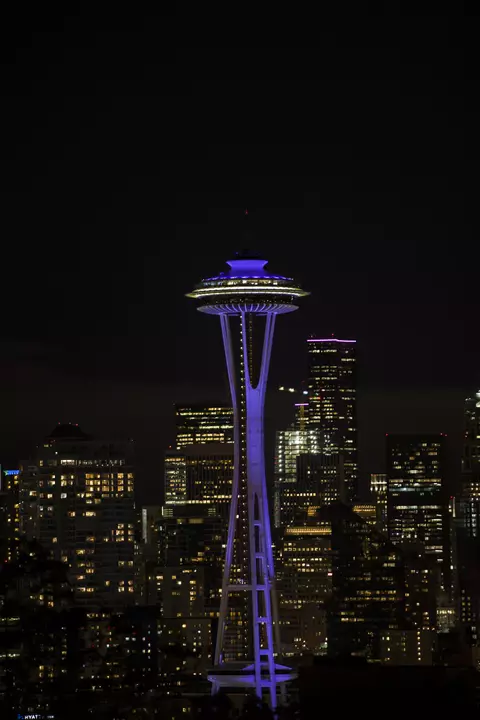 Space Needle lit purple at night for the Togetheruw campaign