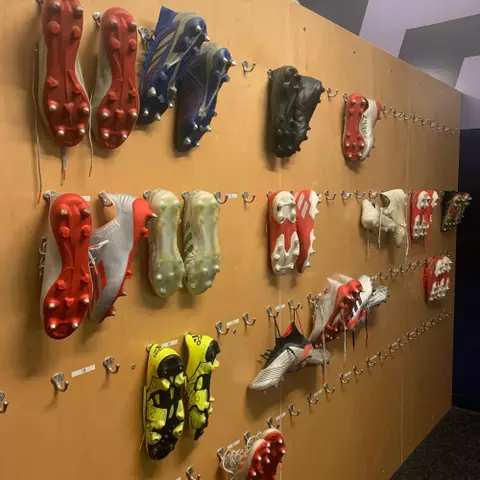 MSOC Locker Room Boot Wall
