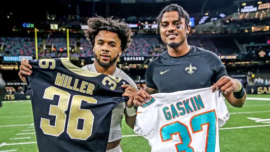Myles Gaskin and Jordan Miller Jersey Swap Postgame