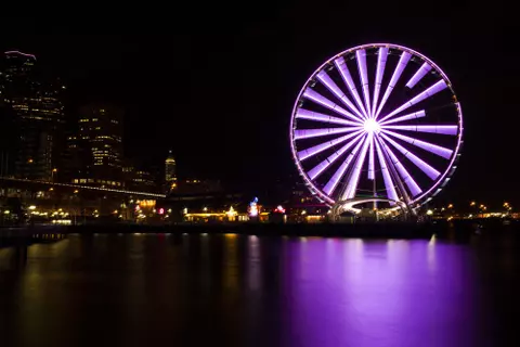 Seattle Great Wheel, lit purple at night for the Togetheruw campaign