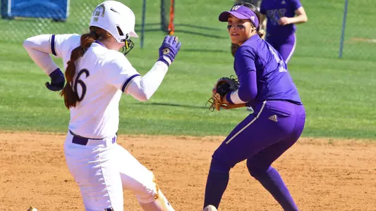Ari Quinones throws to first to complete a doubleplay
