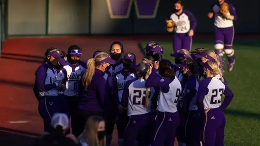 The team huddles together