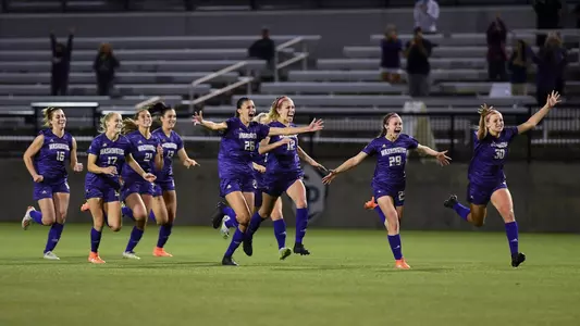 The team celebrates the game-winning PK