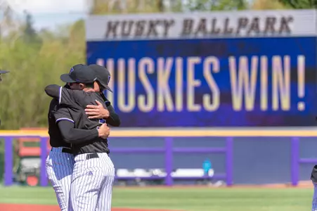 Husky Players Embrace Following the Final Home Game of the 2022 Season
