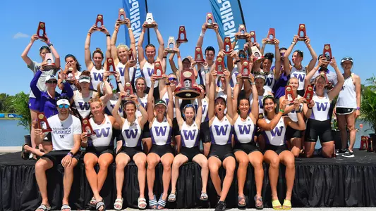 UW women's rowing team with fourth place trophy at NCAAs