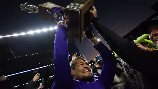 Rome Odunze hoists Apple Cup trophy