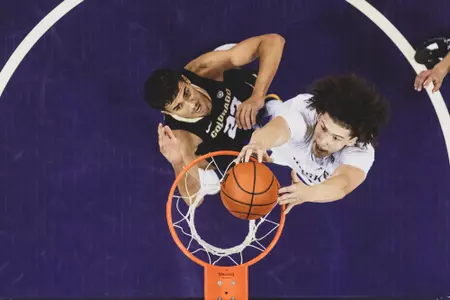The University of Washington menβs basketball team plays Colorado on December 4, 2022. (Photography by Scott Eklund/Red Box Pictures)