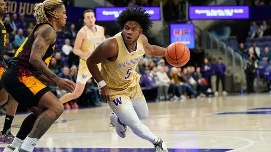 Sahvir Wheeler drives against Arizona State