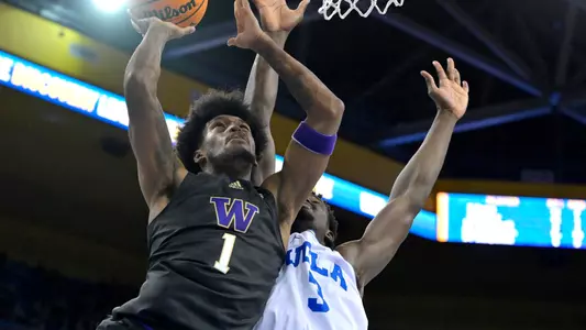 Keion Brooks Jr. drives against UCLA in 2023