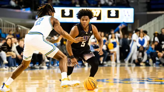 Sahvir Wheeler dribbles at UCLA