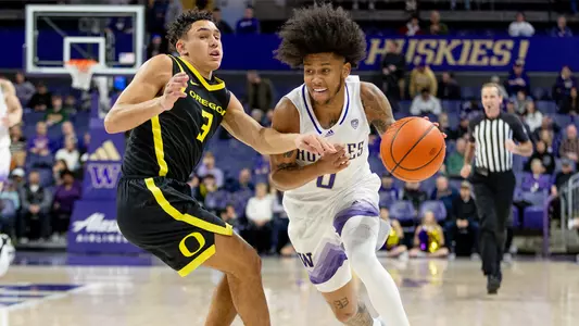 Koren Johnson drives against Oregon