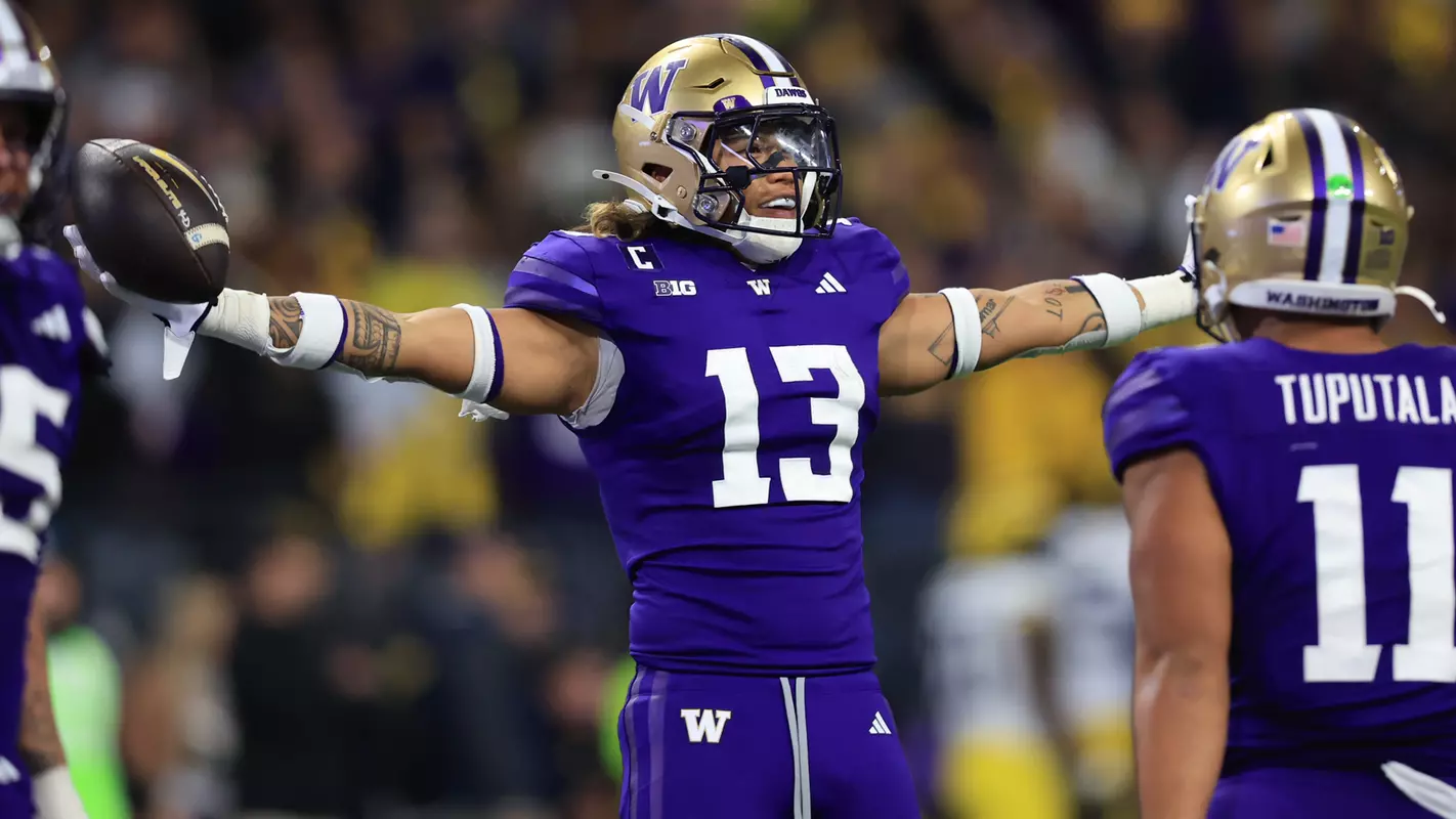 Kamren Fabiculanan celebrates after INT against Michigan