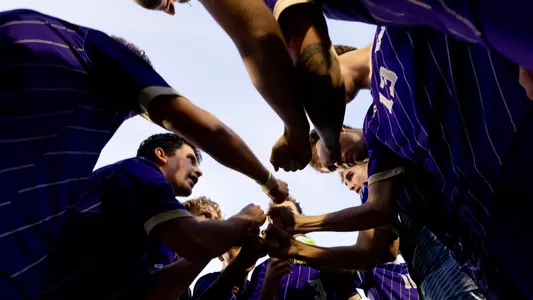 Men's Soccer Team Huddle