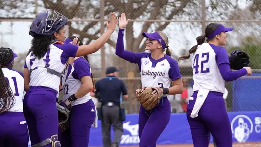 Rylee Holotrf and Sydney Stewart High Five