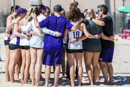 Beach Volleyball team huddle