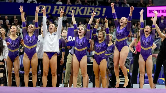 Gymnastics cheering Washington Quad Meet