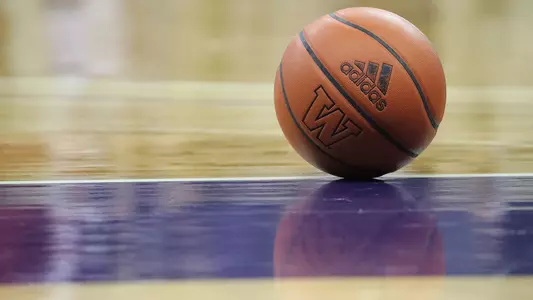 Basketball with adidas and UW logo on it