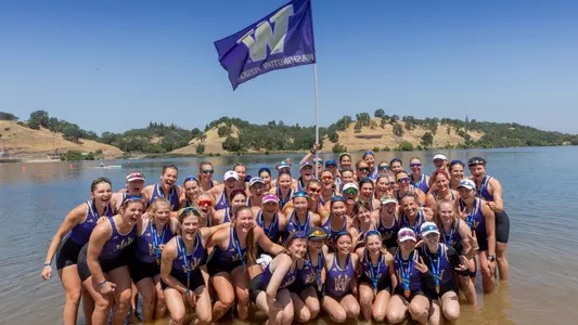 2024 women's rowing team photo on beach at pac-12 championships