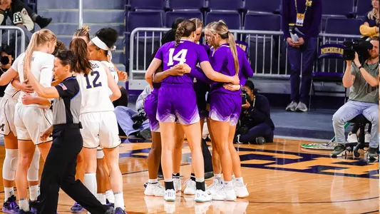 WBB huddle at Michigan