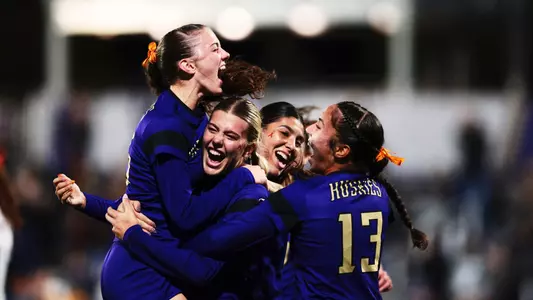 Alex Buck, Kelsey Branson, Andrea Leyva and Samiah Shell celebrate a goal vs. Minnesota