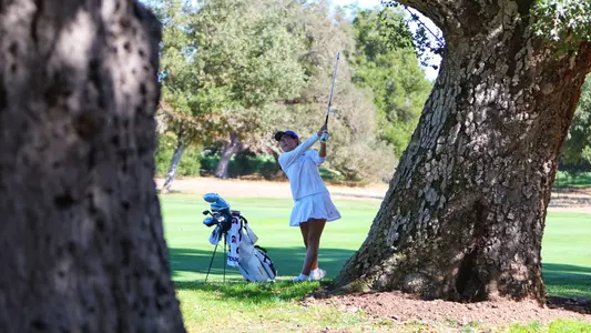 Wendy Tang finishing golf swing