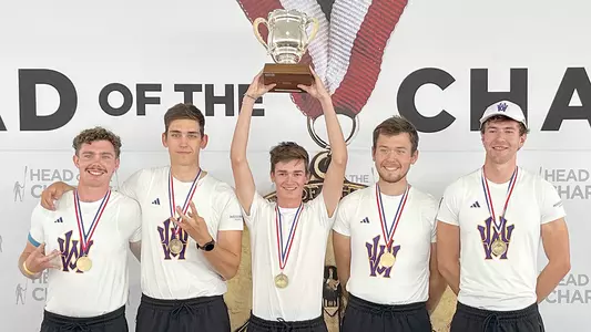 uw men's four at 2025 head of the charles with trophy