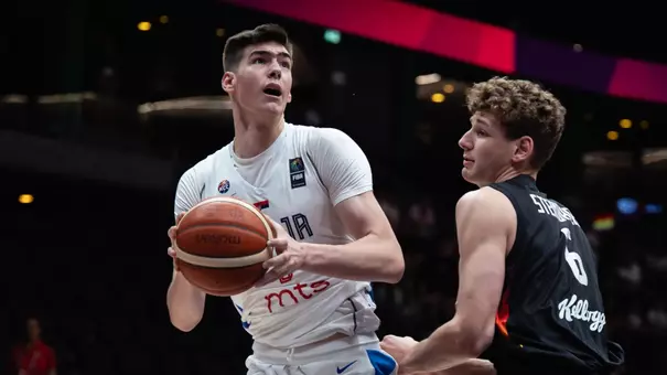 Nikola Dzepina posts up Hannes Steinbach during the 2025 FIBA U19 World Cup