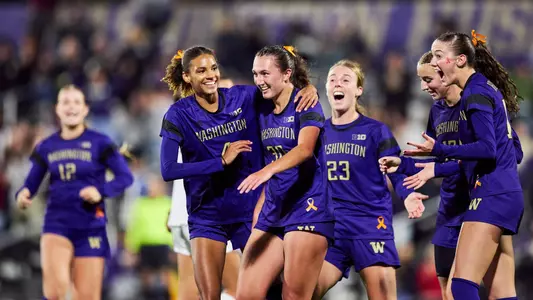 Avery Nguyen and Maya Loudd celebrating a goal against Minnesota