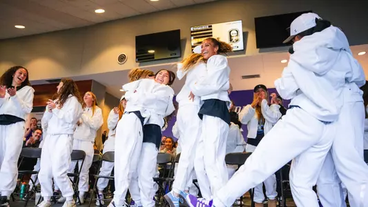 The UW women's soccer team celebrates its selection to the 2025 NCAA Tournament