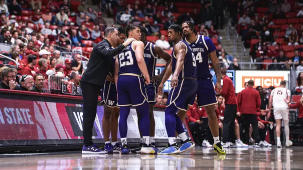 Team huddle at Washington State