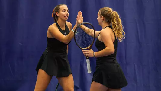 Alexia Jacobs and Marie Weissheim high five