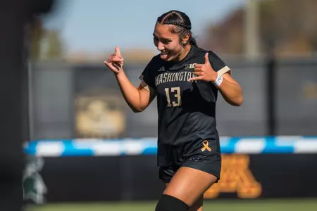 Samiah Shell celebrates a goal during Washington's 2-0 win over Illinois in the Big Ten Tournament Quarterfinals