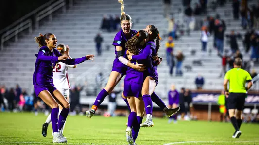 Maya Loudd, Kelsey Branson, Alex Buck and Samiah Shell celebrate the game winner vs. Arkansas