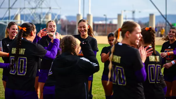 Kalea Eichenberger during pregame huddle celebration