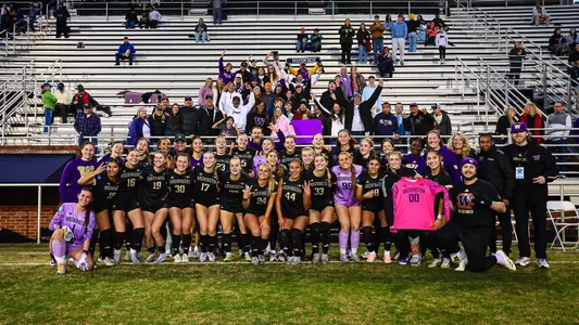 Team photo following UW's penalty shootout win over Virginia to advance to the Elite Eight