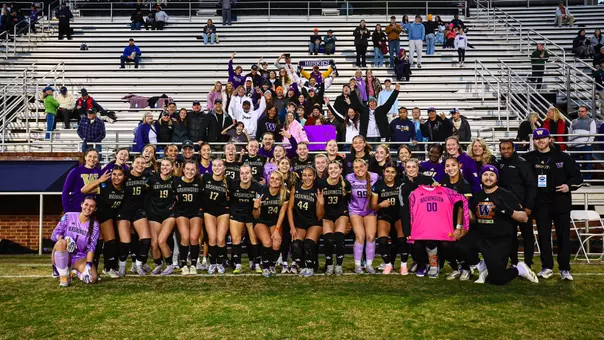 Team photo following UW's penalty shootout win over Virginia to advance to the Elite Eight