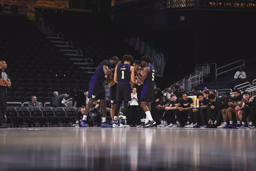 UW Men's Basketball huddle vs Colorado at Acrisure Classic