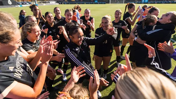 Washington celebrates its 2-0 win over Illinois in the Big Ten Tournament Quarterfinals
