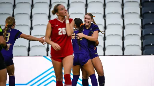 Maylen Montoya and Samiah Shell celebrate a goal