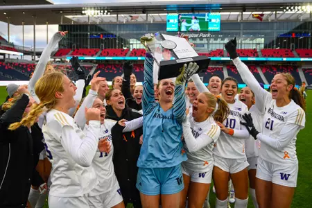 Tanner Ijams lifts the trophy after UW's 4-1 penalty shootout win to secure the 2025 Big Ten Tournament Championship