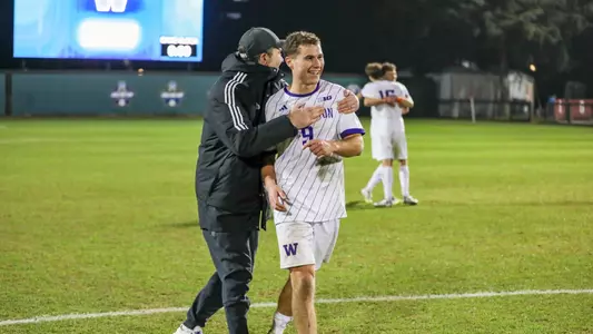 Charlie Kosakoff and Jamie Clark celebrate after Kosakoff's game-winning goal in the third round of the NCAA Tournament over Stanford.