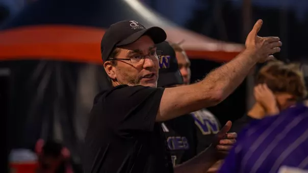 Jamie Clark instructs UW Men's Soccer players during a match against Oregon State