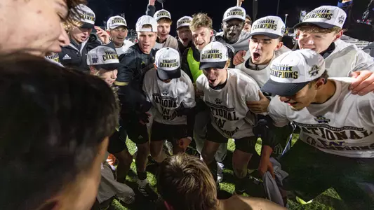 UW Men's Soccer celebrates winning the NCAA Championship