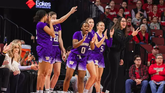 UW WBB bench celebration at Nebraska