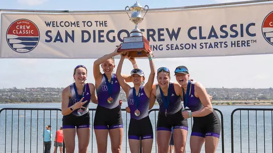 UW varsity four with trophy at San Diego Crew Classic 2025
