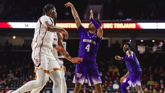 DJ Davis follows through on a three-point attempt at USC