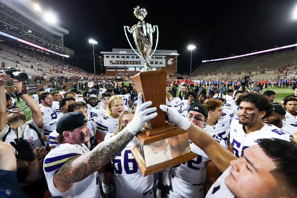 The Huskies hoist the 2025 Apple Cup trophy