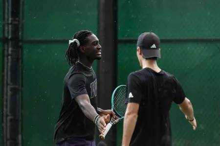 Stephane Kamendje warms up vs Hawaii