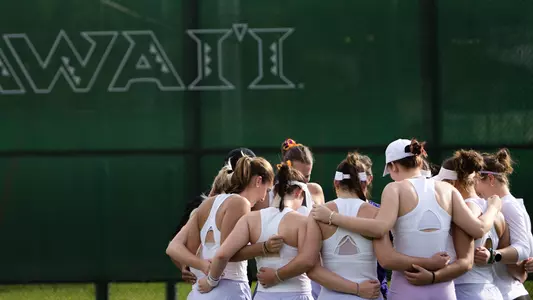 Women's Tennis Team Huddle