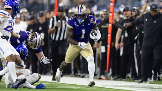 Jonah Coleman runs with the ball in LA Bowl against Boise State